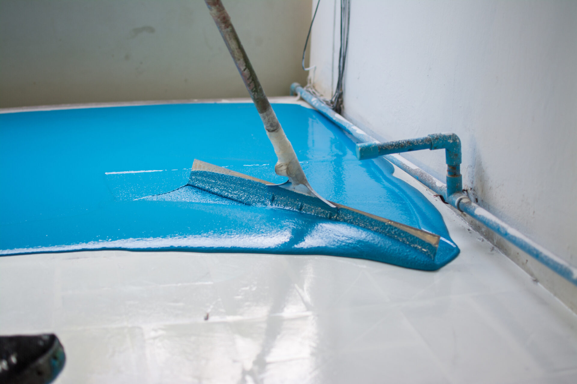 Self-leveling blue epoxy floor